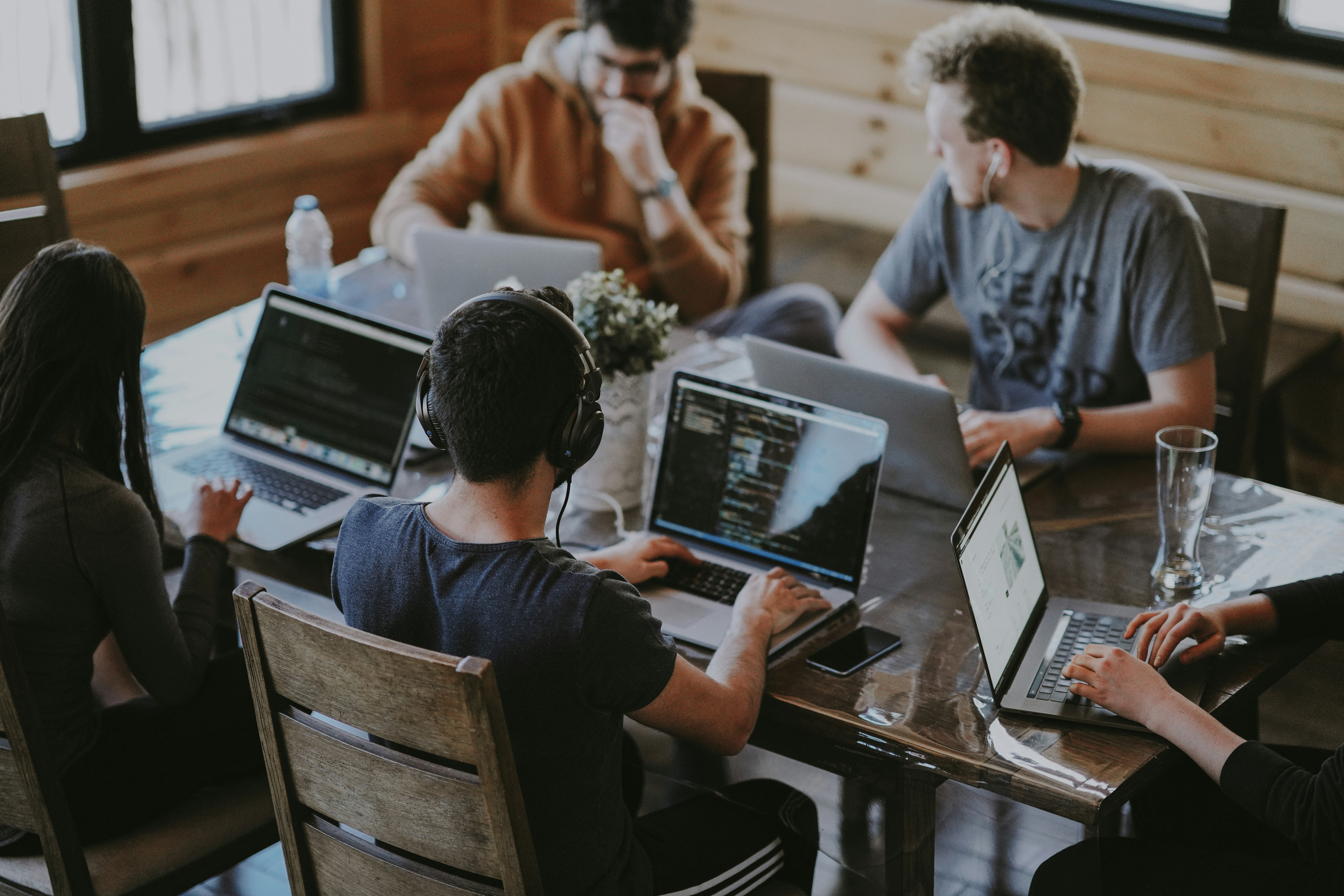 Senior AEO and GEO strategist reviewing AI citation data and generative engine visibility reports. Replace with real team photo.